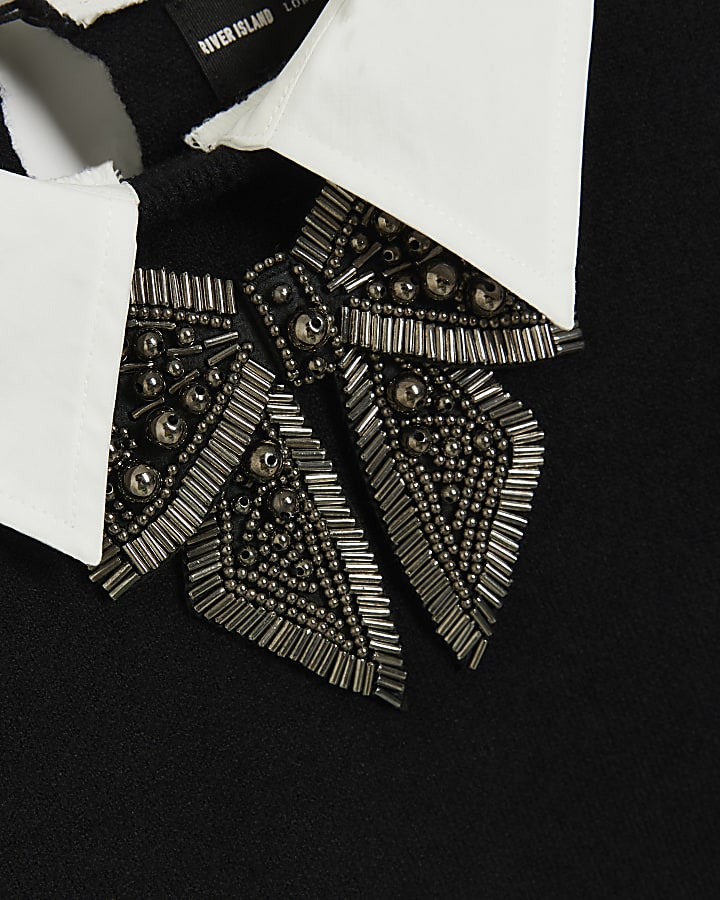 Black fluffy bow hybrid jumper