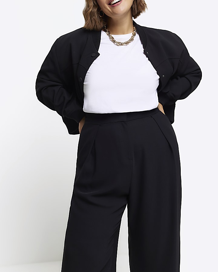 Black pleated wide leg trousers