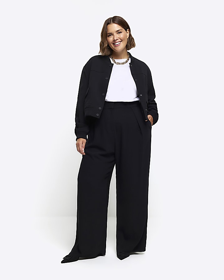 Black pleated wide leg trousers