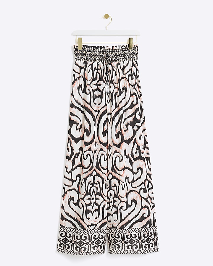 Cream abstract wide leg beach trousers