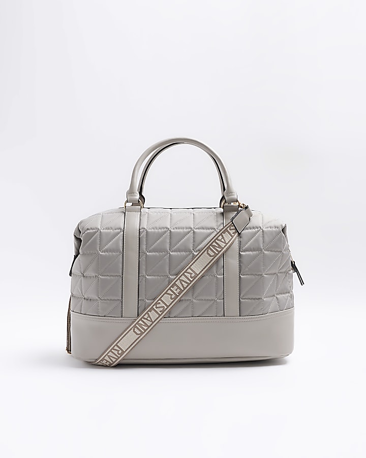 Grey quilted zip travel bag