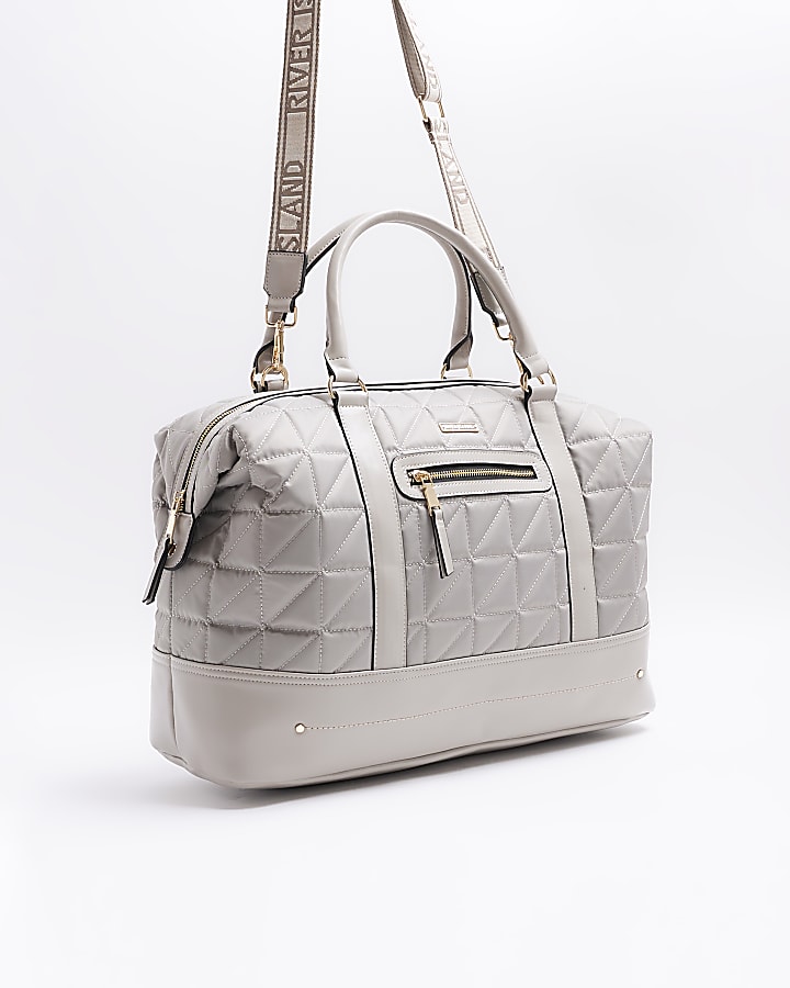 Grey quilted zip travel bag