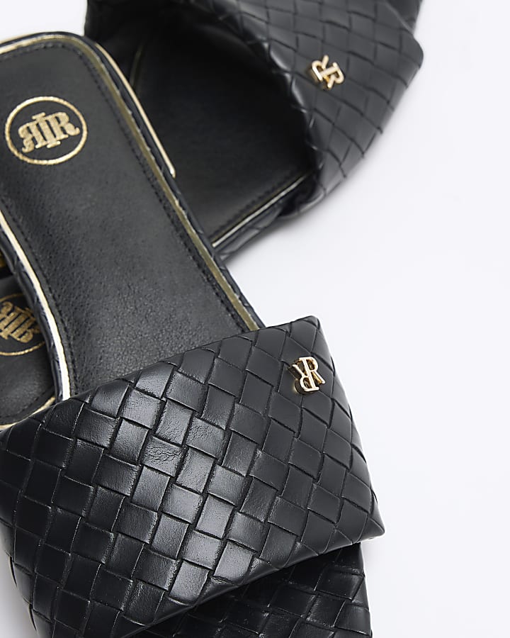 Black woven flat sandals