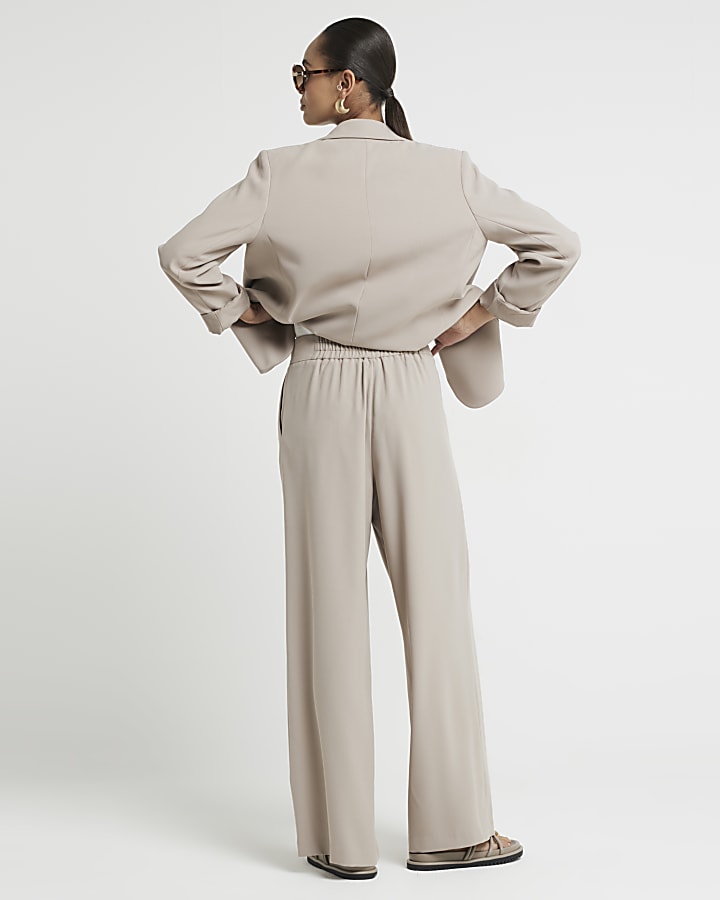 Beige elasticated wide leg trousers