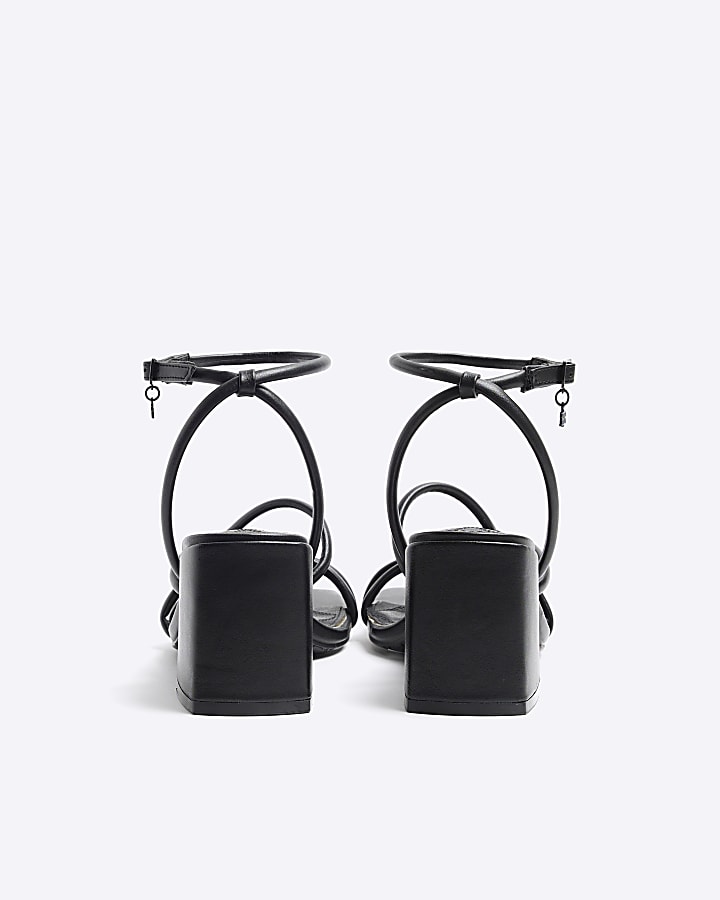 Black strappy heeled sandals