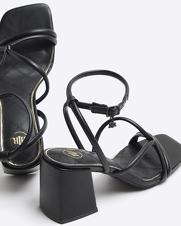 Black strappy heeled sandals