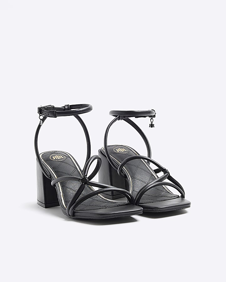 Black strappy heeled sandals