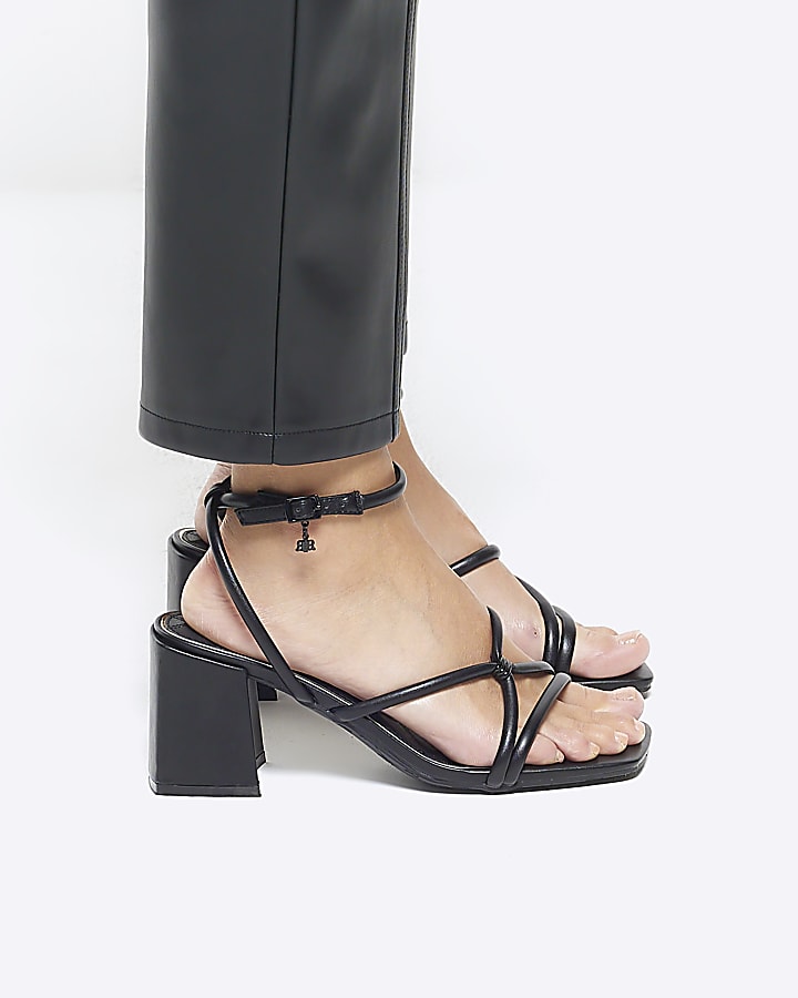 Black strappy heeled sandals