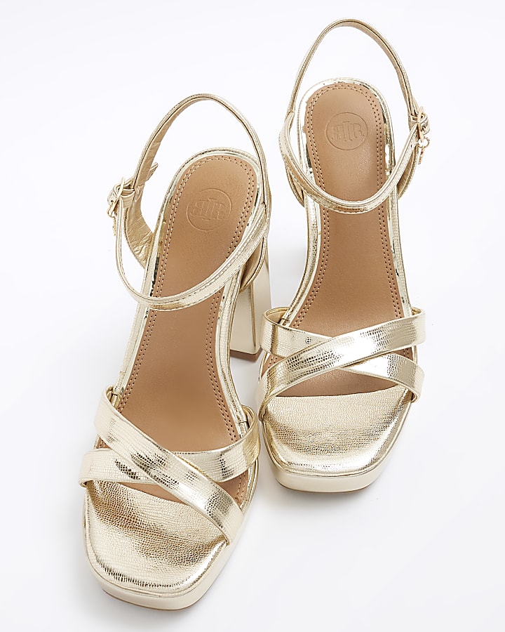 Gold crossed strap heeled sandals