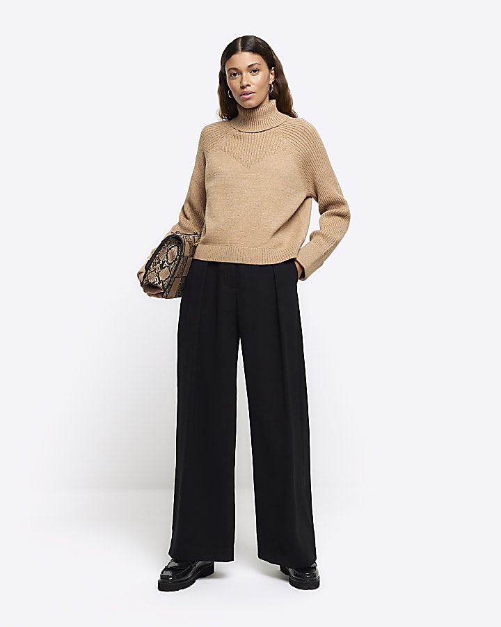 Beige rib roll neck jumper