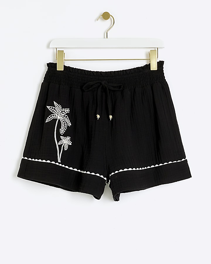 Black embroidered palm tree shorts