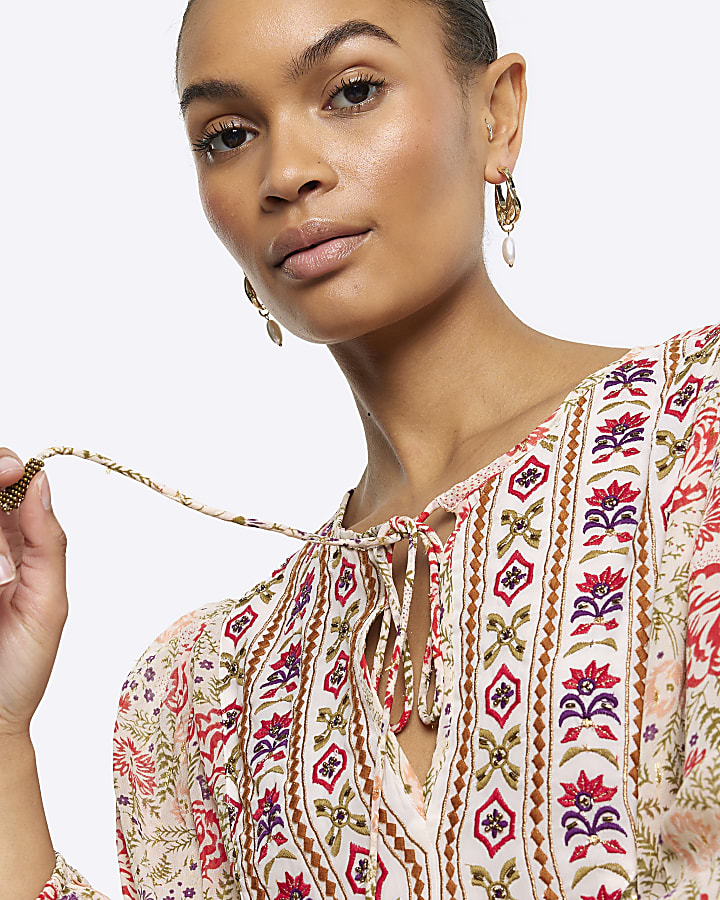 Cream floral embroidered smock top