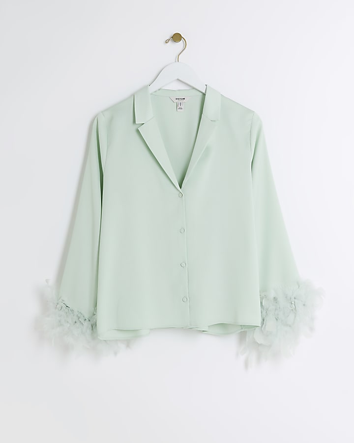 Green feather cuff shirt