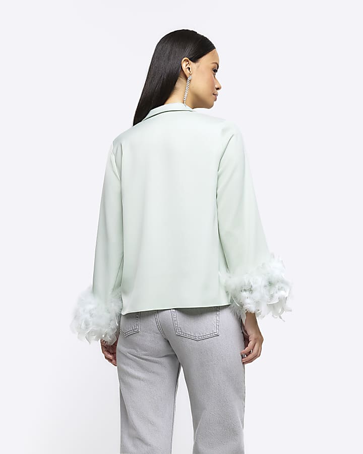 Green feather cuff shirt