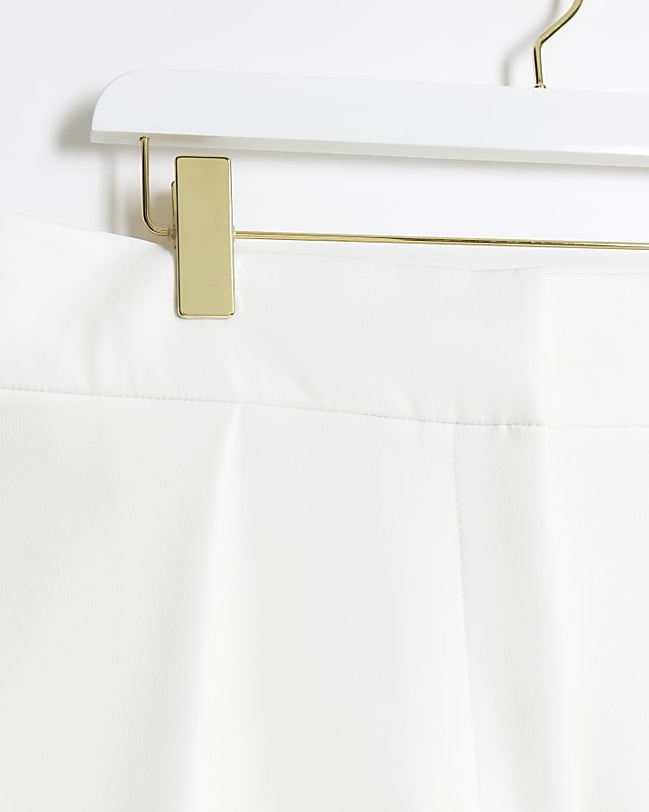 Plus white pleated wide leg trousers