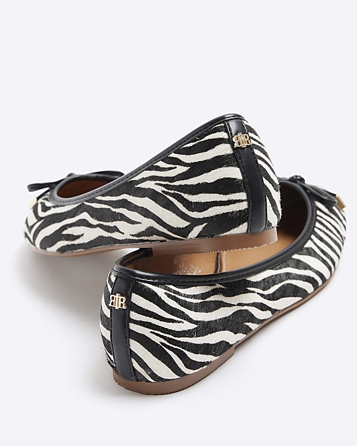 White animal print ballet pumps