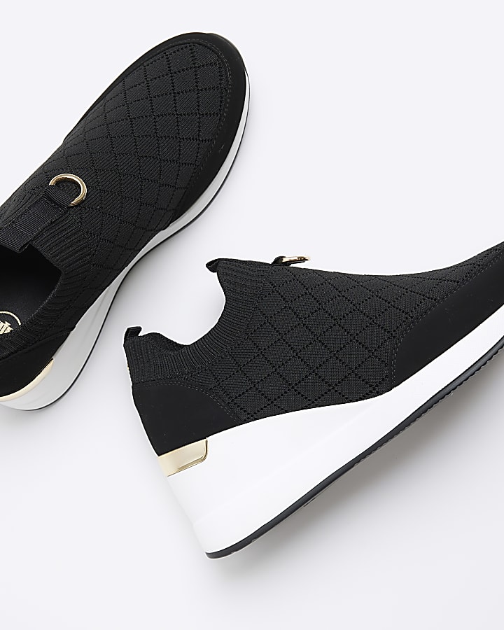 Black wide fit quilted wedge trainers