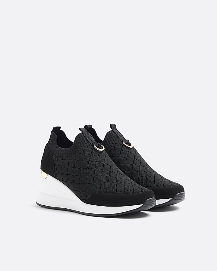 Black wide fit quilted wedge trainers