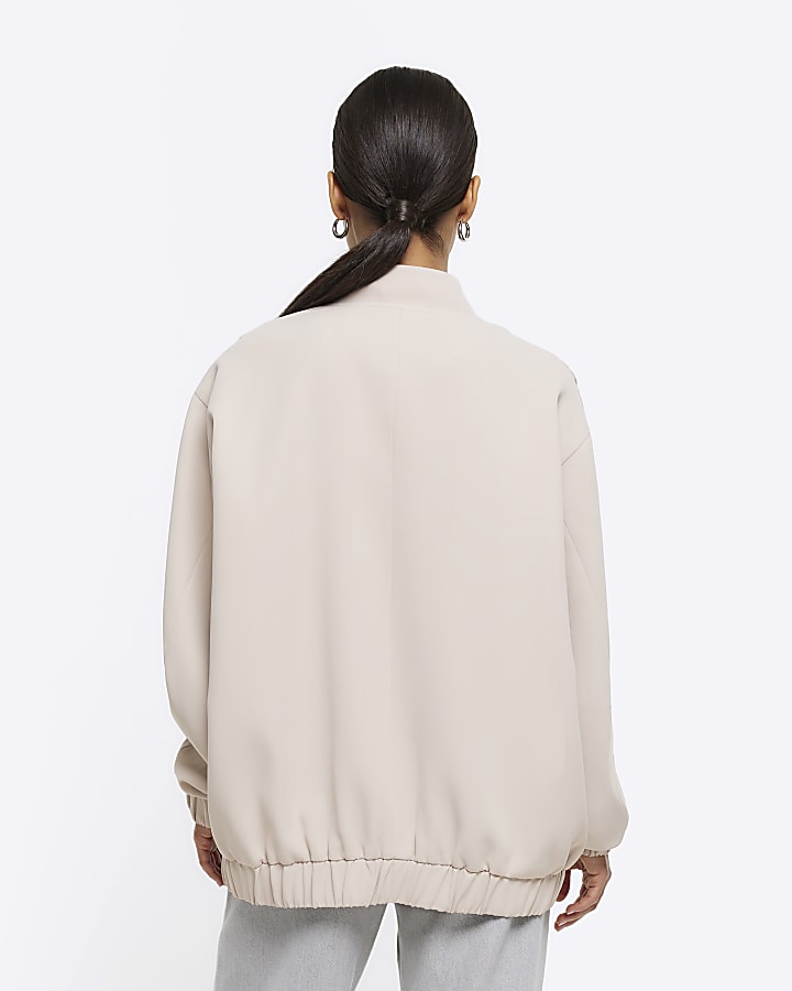 Petite beige oversized bomber jacket