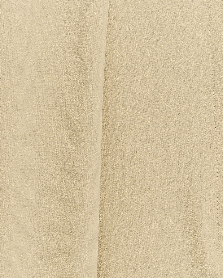 Beige high waisted wide leg trousers