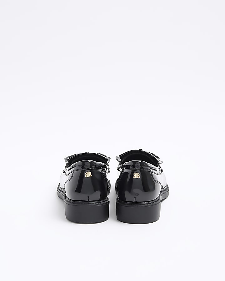 Black bow fringe loafers