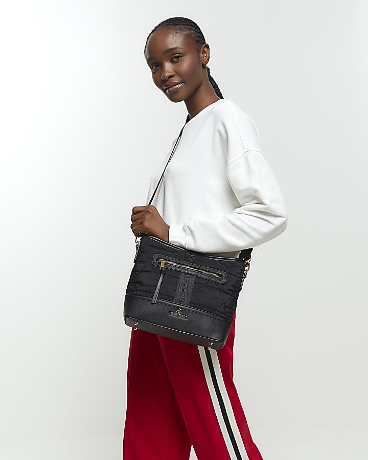 Black webbing quilted cross body bag