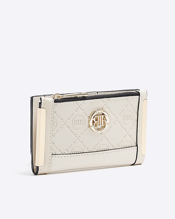 Cream embossed monogram mini purse