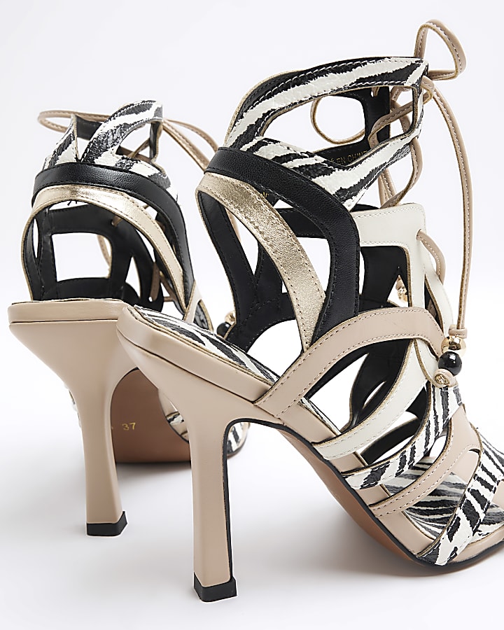 Beige animal print caged heeled sandals