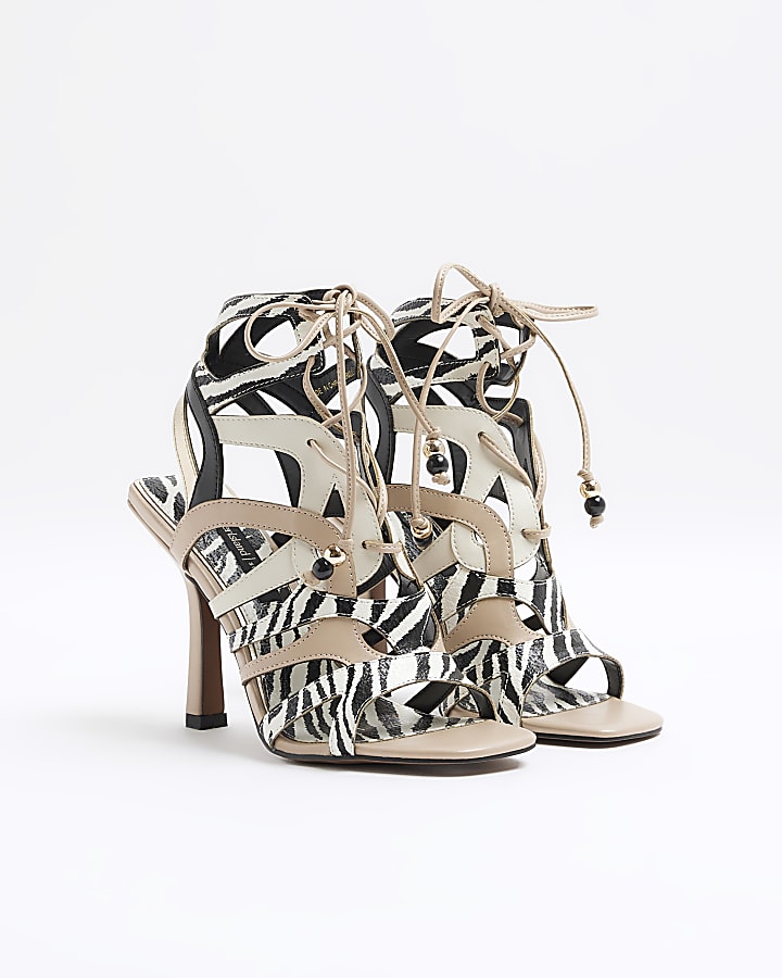 Beige animal print caged heeled sandals