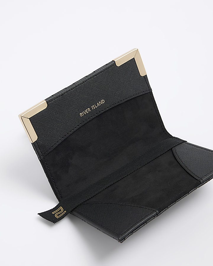 Black embossed passport holder