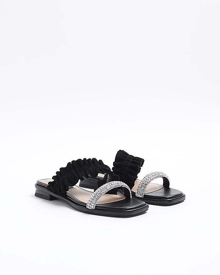Black suede ruffle strap sandals