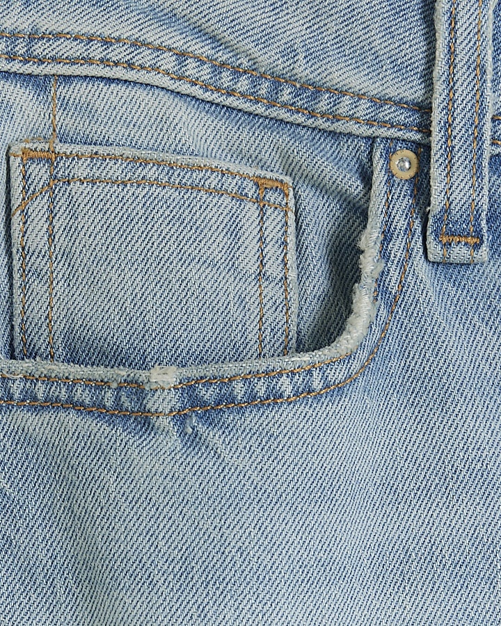 Blue high waisted ripped mom jeans