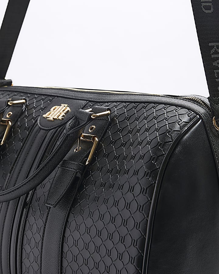 Black medium embossed RI monogram travel bag