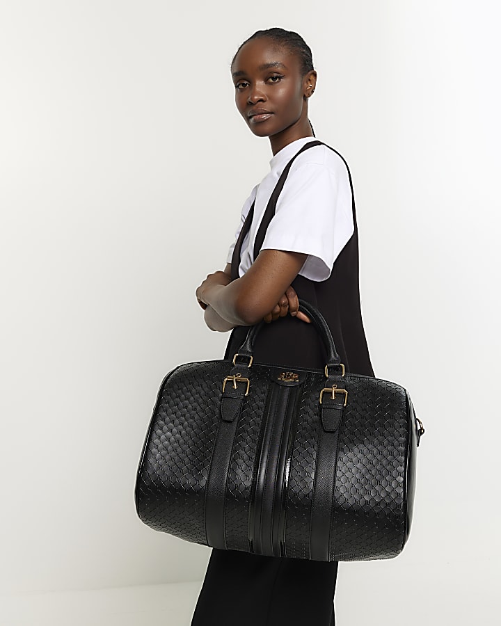 Black medium embossed RI monogram travel bag