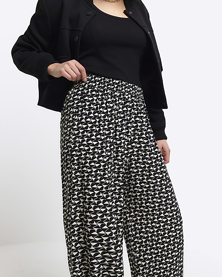 Petite black geometric wide leg trousers