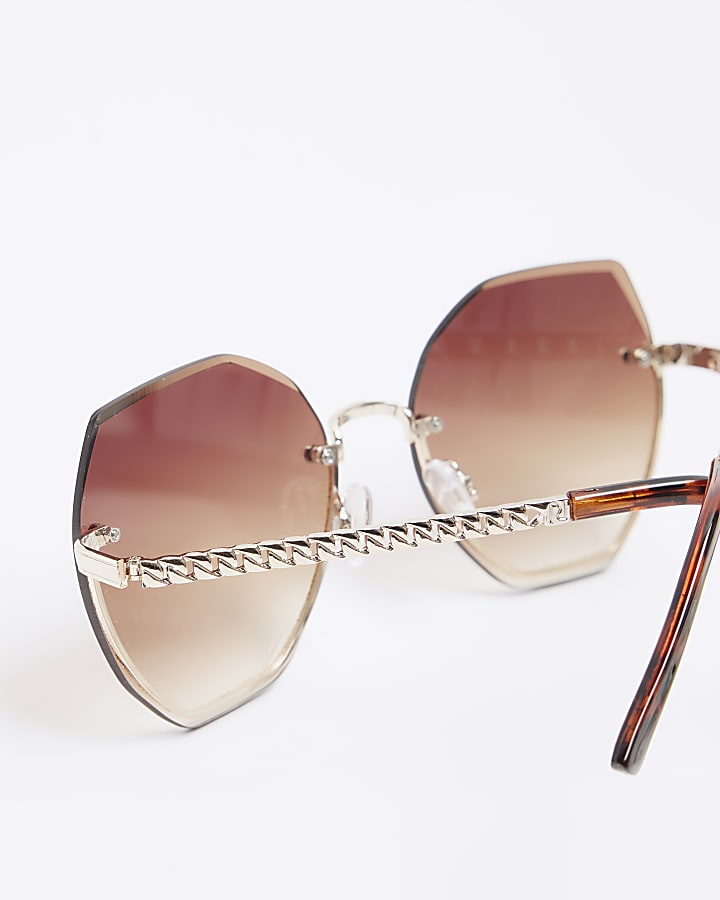 Gold rimless hexagon sunglasses