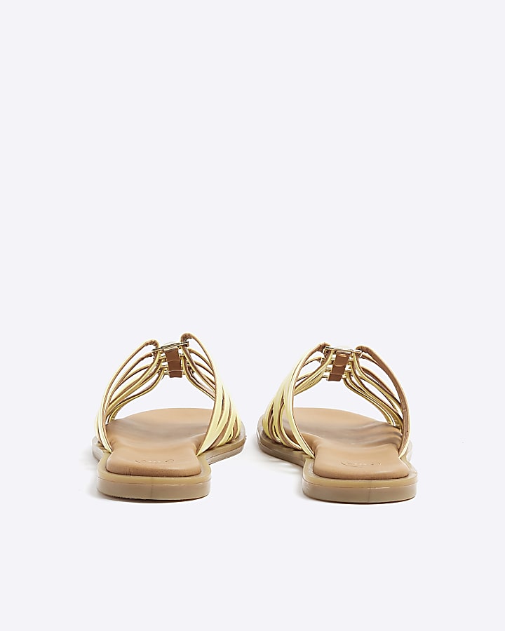 Yellow strappy flat sandals