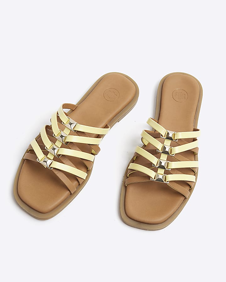 Yellow strappy flat sandals