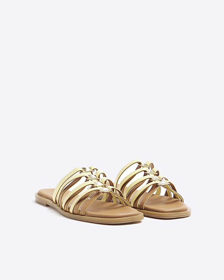 Yellow strappy flat sandals