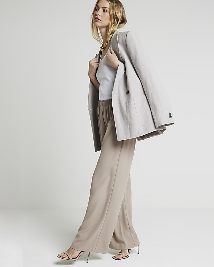 Beige pull on wide leg trousers