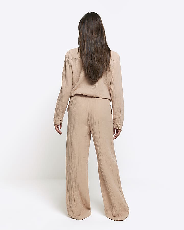 Beige textured wide leg trousers