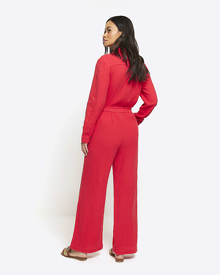 Red textured wide leg trousers