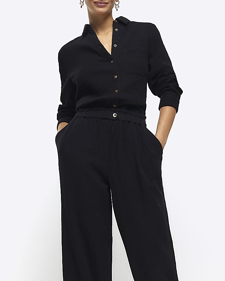 Black textured wide leg trousers