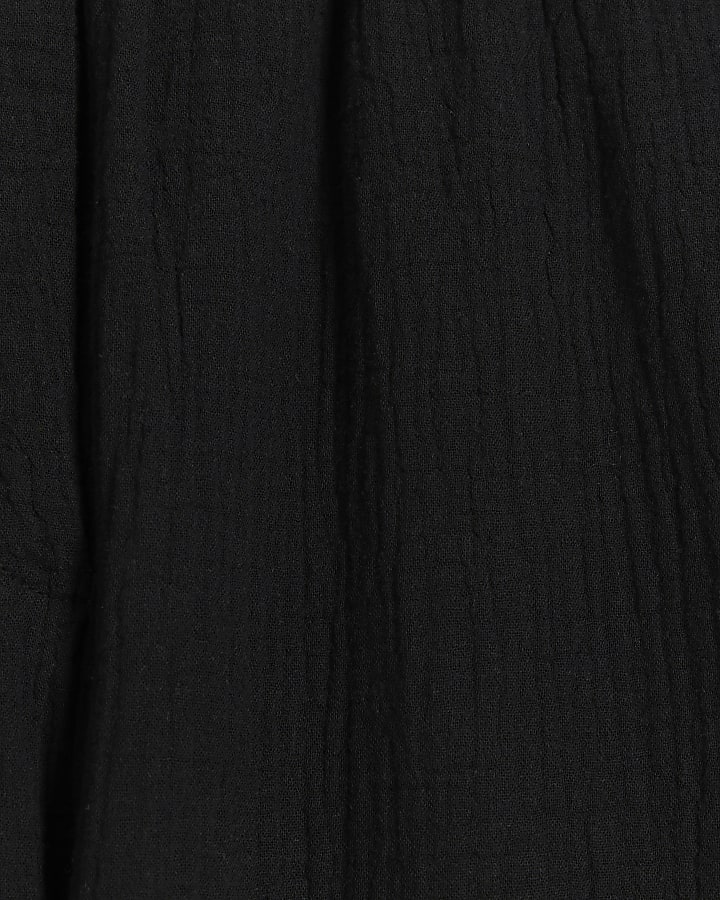 Black textured wide leg trousers