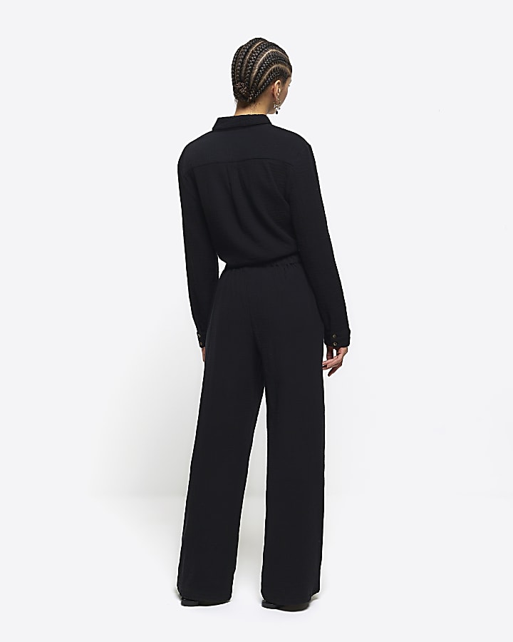 Black textured wide leg trousers