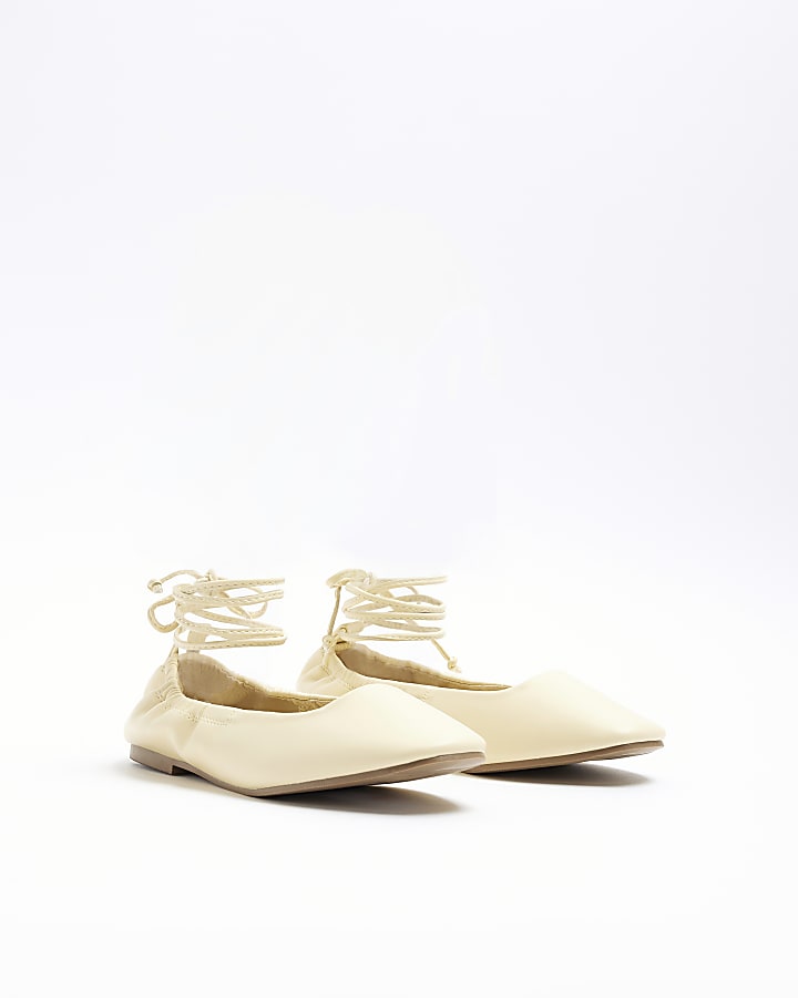 Yellow tie up ballet pumps