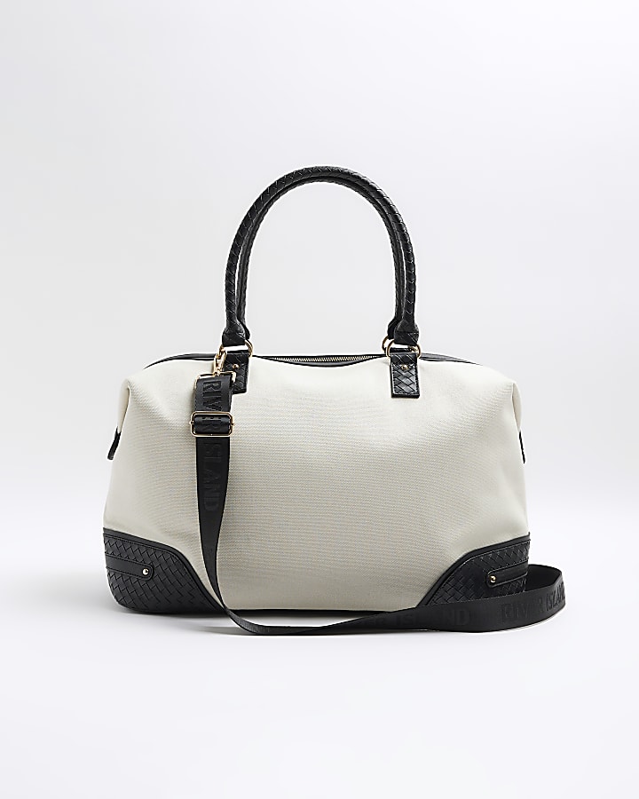 Cream canvas travel bag