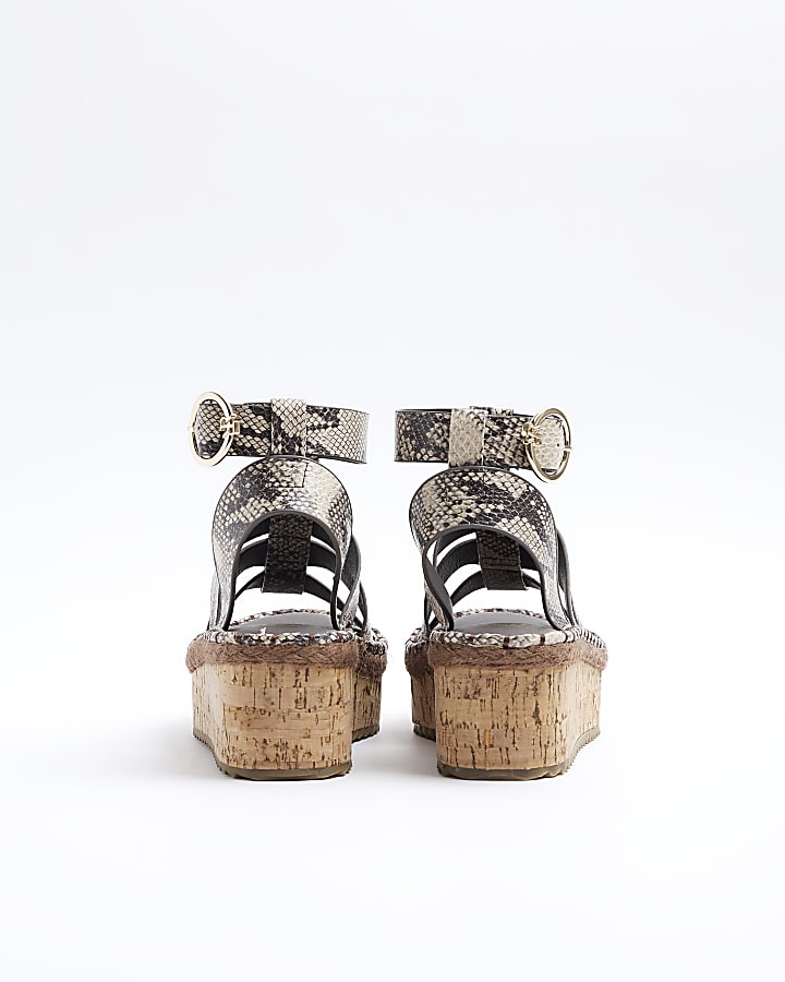 Grey snakeskin gladiator flatform sandals