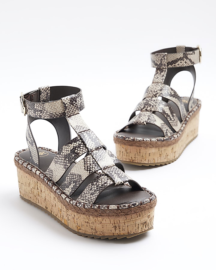 Grey snakeskin gladiator flatform sandals