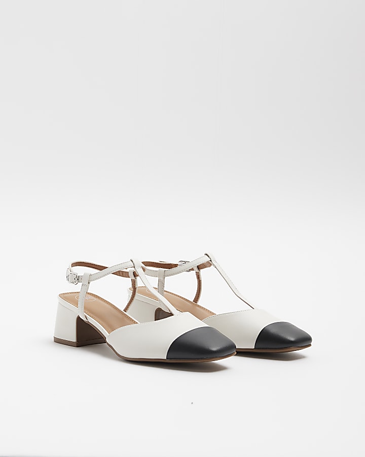 White block heeled court shoes